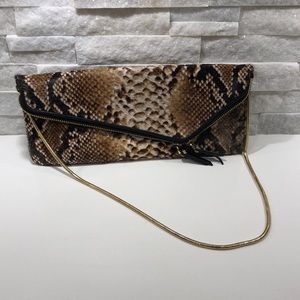 Henri Bendel ponyhair Deb slim in snake pattern